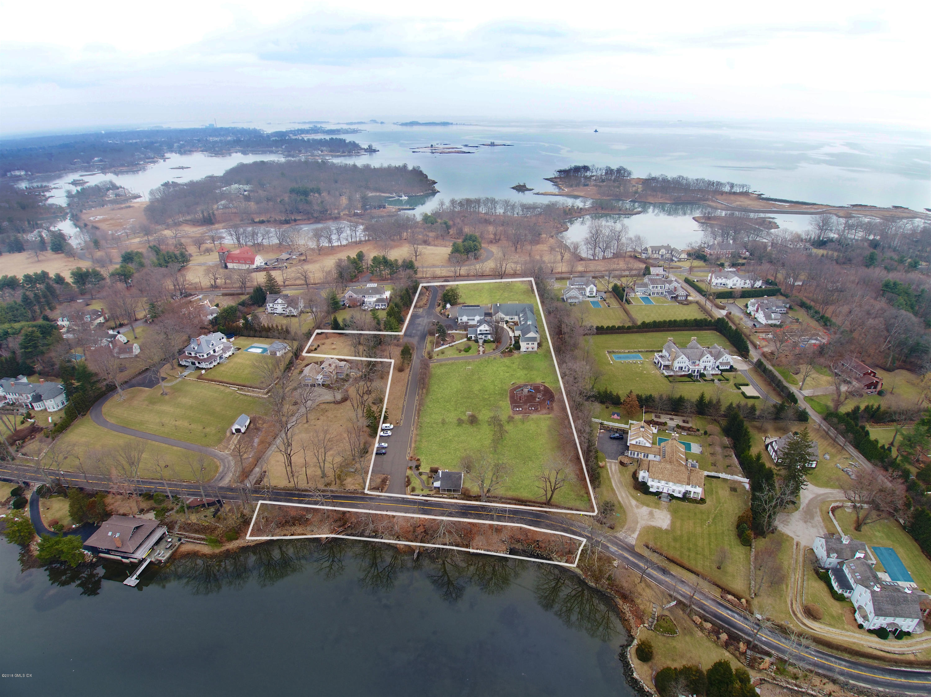 90 Pear Tree Point Road Darien, CT 06820 - Photo 3 of 3 an aerial view of residential houses with outdoor space