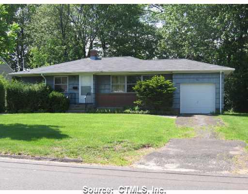 269 Reservoir Road Newington, CT 06111 - Photo 1 of 1 a front view of a house with a garden