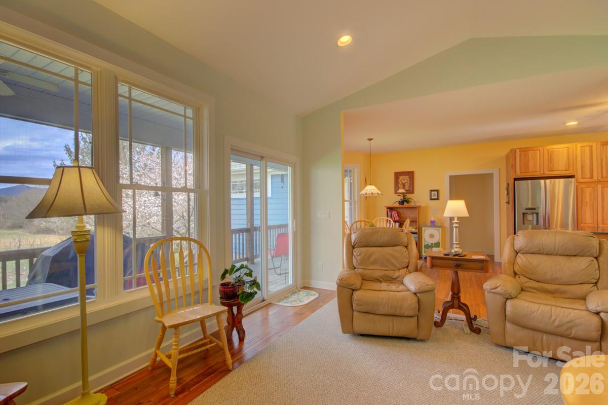 751 Everett Road Pisgah Forest, NC 28768 - Photo 22 of 36 a living room with furniture and a window