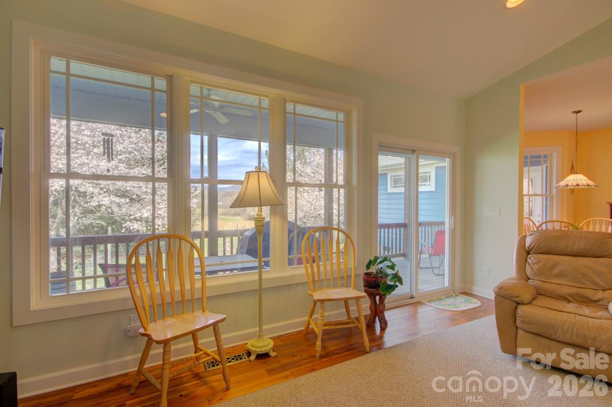 751 Everett Road Pisgah Forest, NC 28768 - Photo 23 of 36 a living room with furniture and a large window