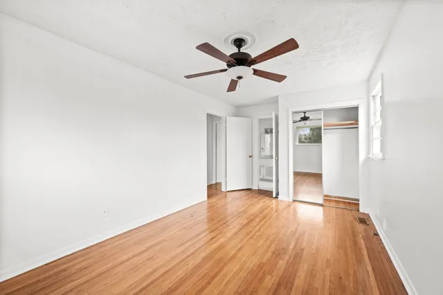 a bathroom with a bath tub and a shower