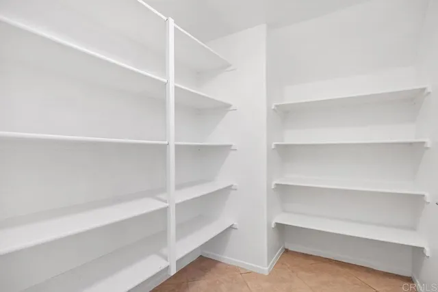 a view of an empty walk in closet