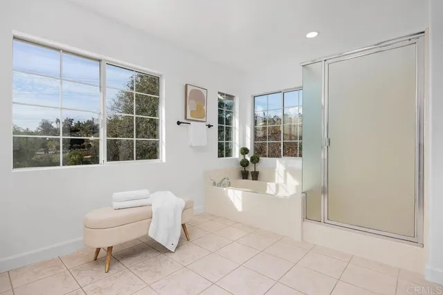 a bathroom with a toilet sink and tub