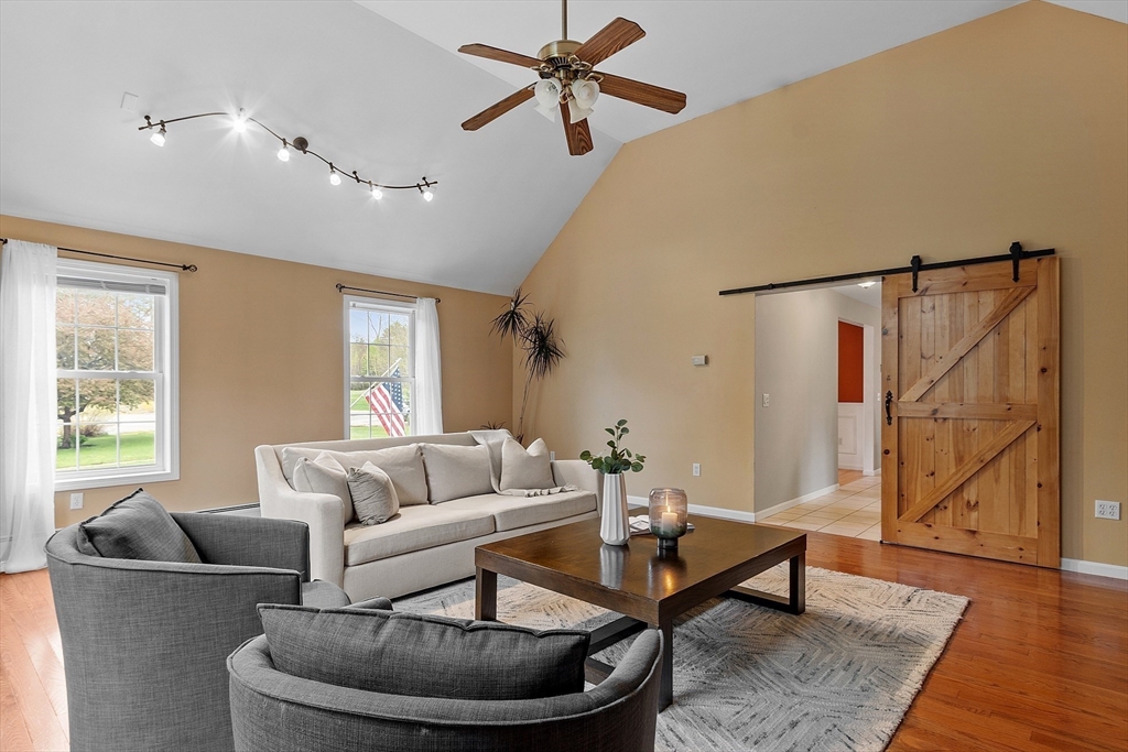 30 Page Epping, NH 03042 - Photo 13 of 42 a living room with furniture and a rug