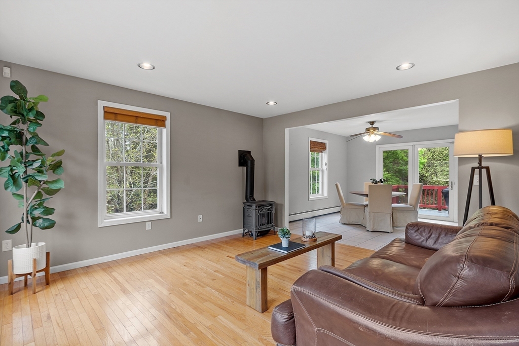 30 Page Epping, NH 03042 - Photo 14 of 42 a living room with furniture window and a potted plant