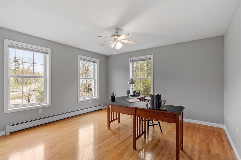 30 Page Epping, NH 03042 - Photo 21 of 42 a workspace with furniture window and wooden floor