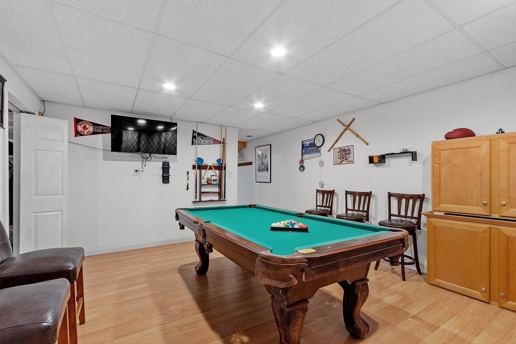30 Page Epping, NH 03042 - Photo 25 of 42 a room with furniture and a flat screen tv