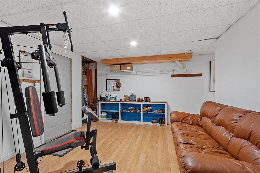 30 Page Epping, NH 03042 - Photo 26 of 42 a living room with furniture and a flat screen tv