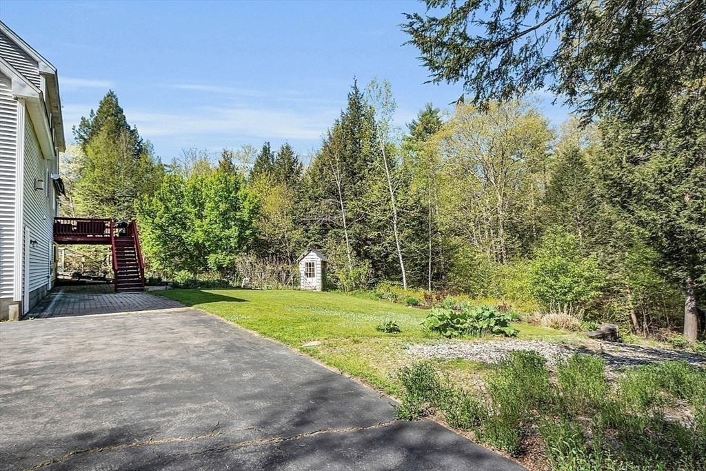 30 Page Epping, NH 03042 - Photo 32 of 42 a big yard with lots of green space and trees
