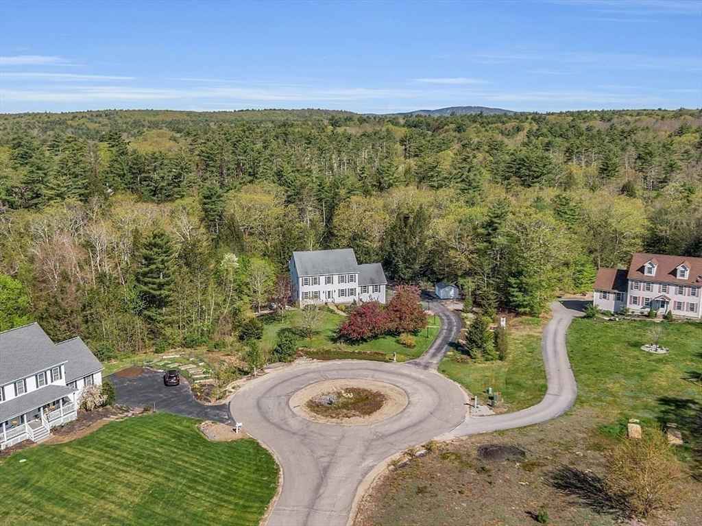 30 Page Epping, NH 03042 - Photo 37 of 42 an aerial view of a house with outdoor space