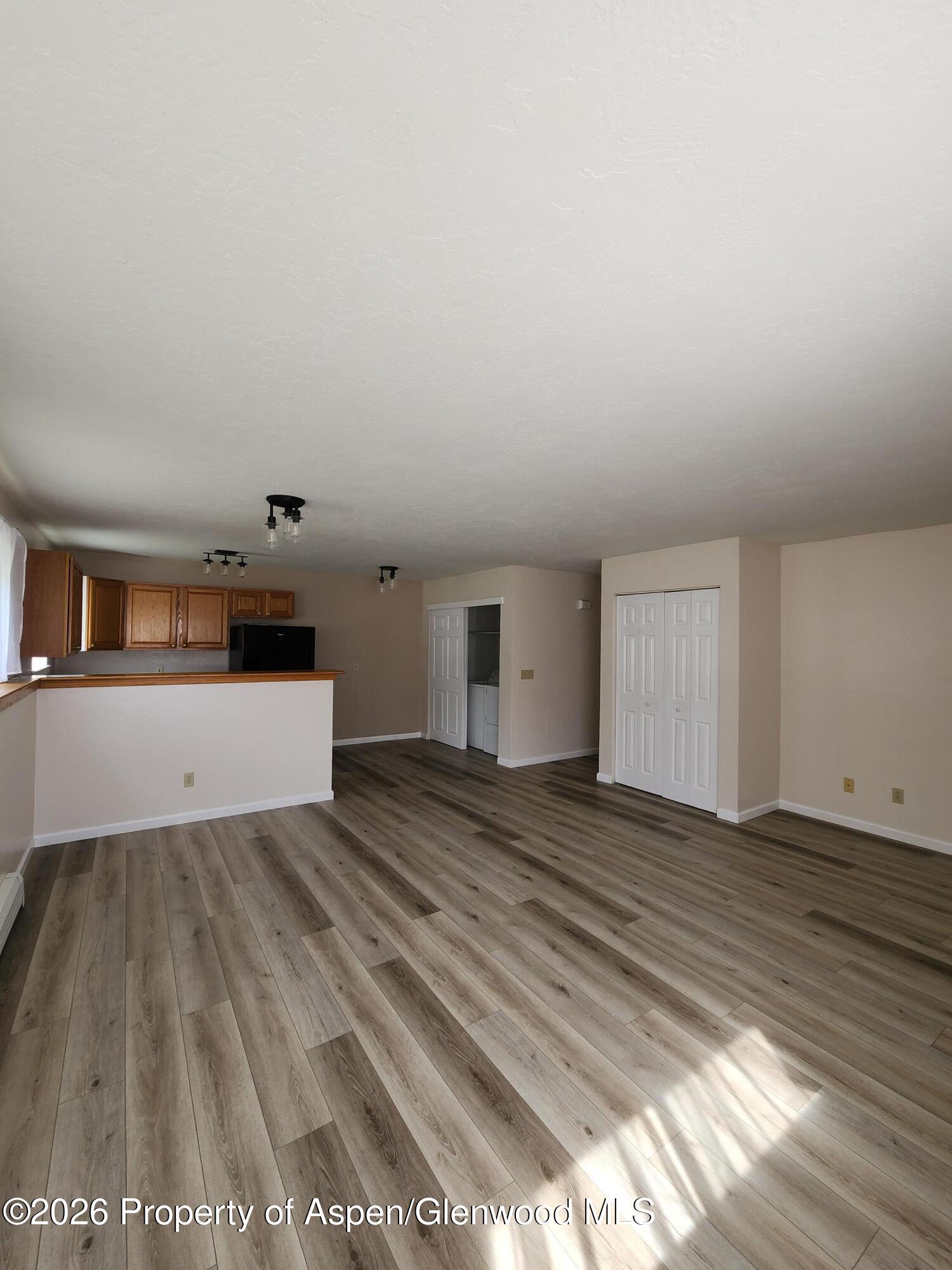 883 Taugenbaugh Boulevard Rifle, CO 81650 - Photo 9 of 18 a view of a room with wooden floor