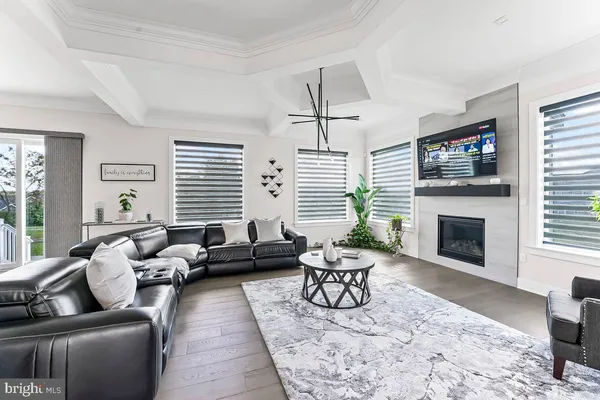 a large kitchen with a table and chairs