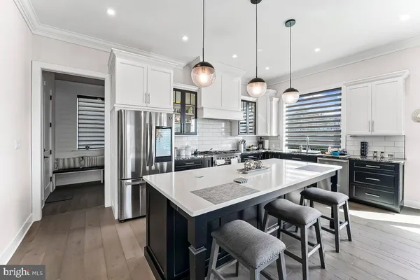 a room that has a bed and a dresser in it