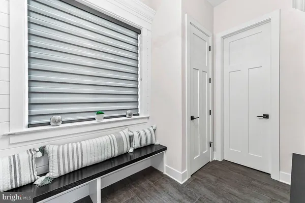 a view of a room with racks on the wall