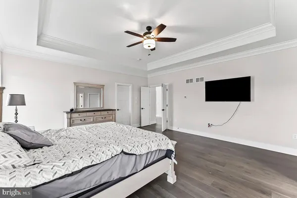 a view of an empty room with windows