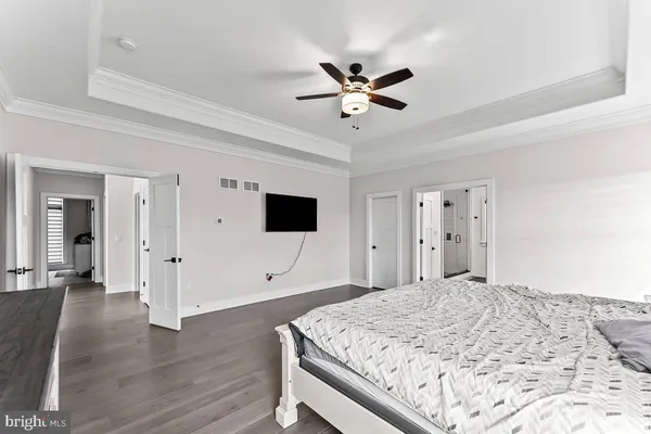 an aerial view of a house with garden space and street view