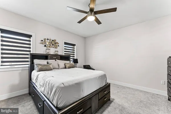 an aerial view of a swimming pool and outdoor space