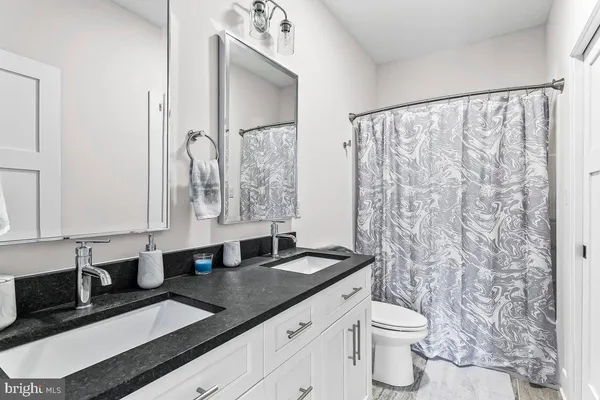 an aerial view of a house having yard