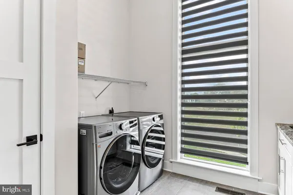 an aerial view of a house with outdoor space