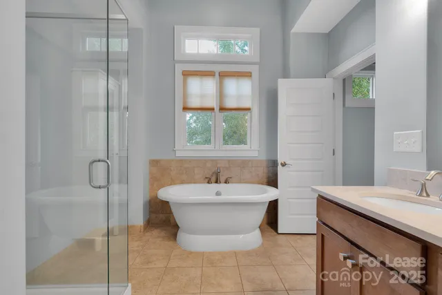 a view of a hallway with washer and dryer