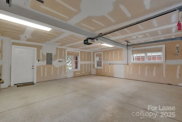 a view of a livingroom with furniture and a window