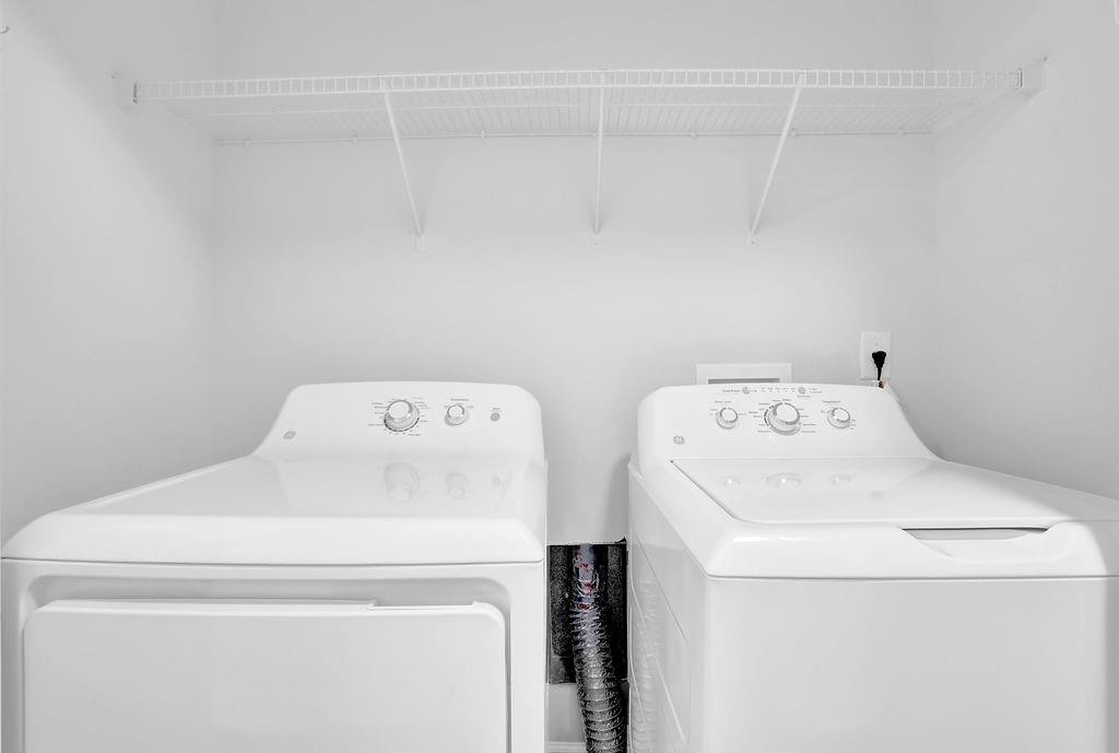 215 Riverstone Commons Circle Canton, GA 30114 - Photo 28 of 36 a utility room with dryer and washer