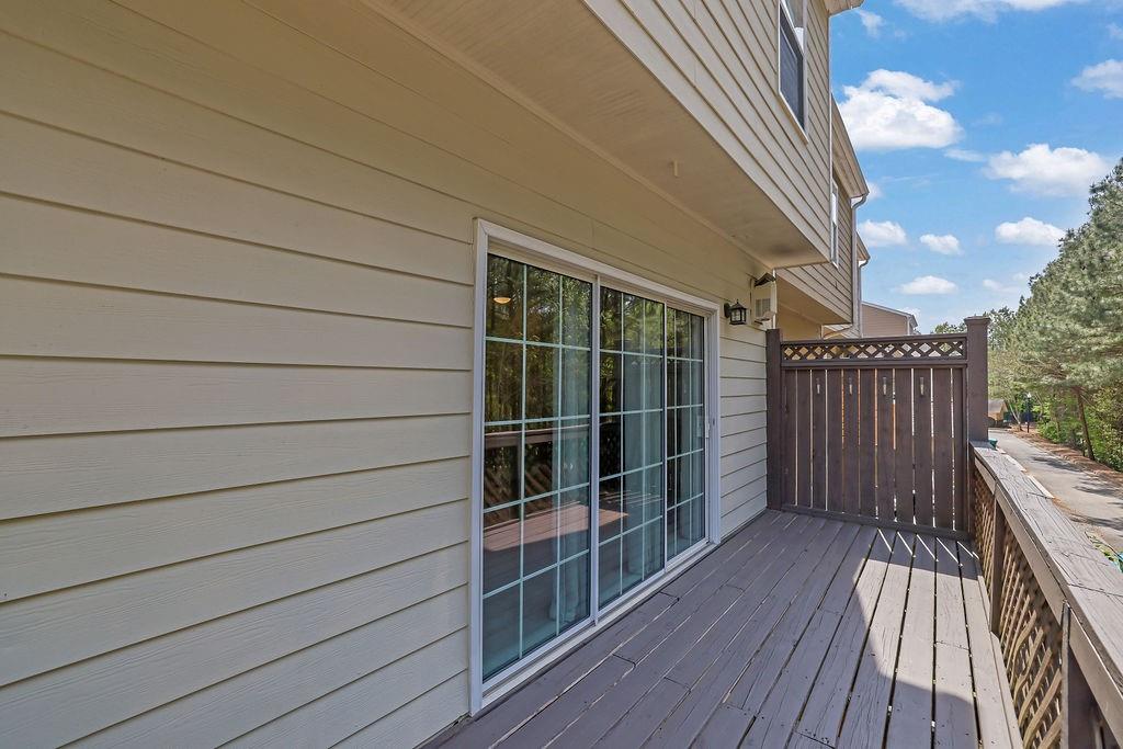 215 Riverstone Commons Circle Canton, GA 30114 - Photo 35 of 36 a view of balcony with wooden floor