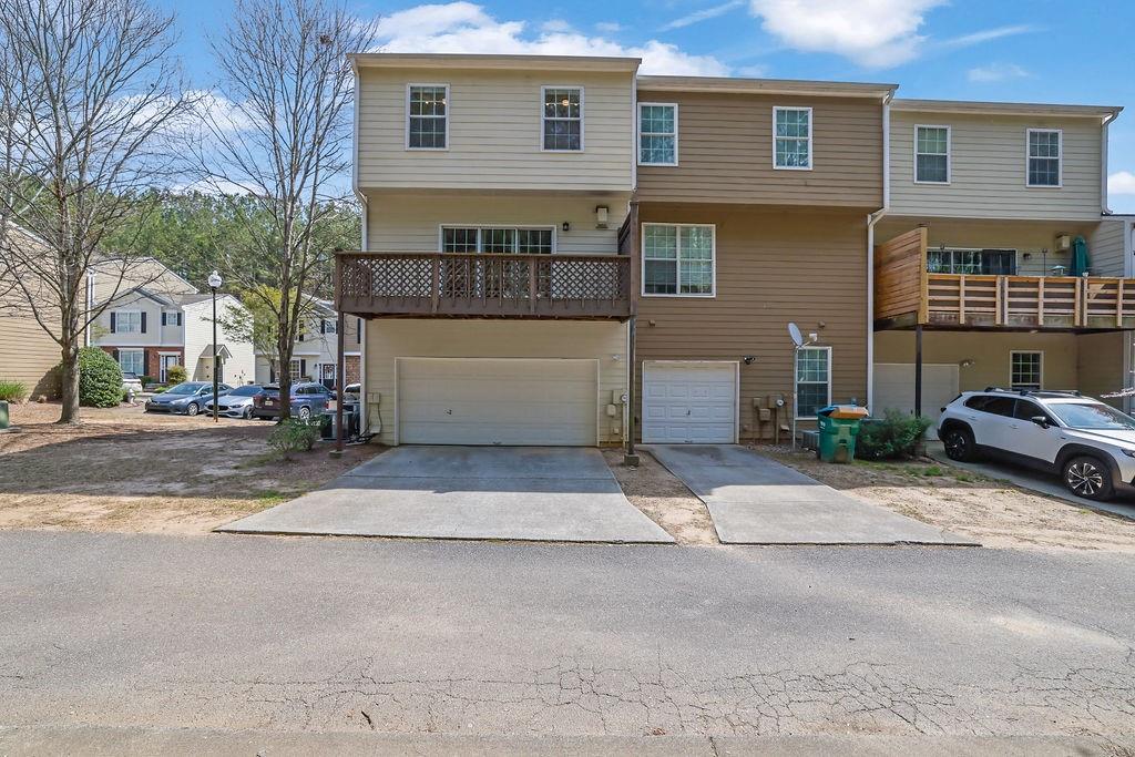 215 Riverstone Commons Circle Canton, GA 30114 - Photo 5 of 36 a house view with a outdoor space