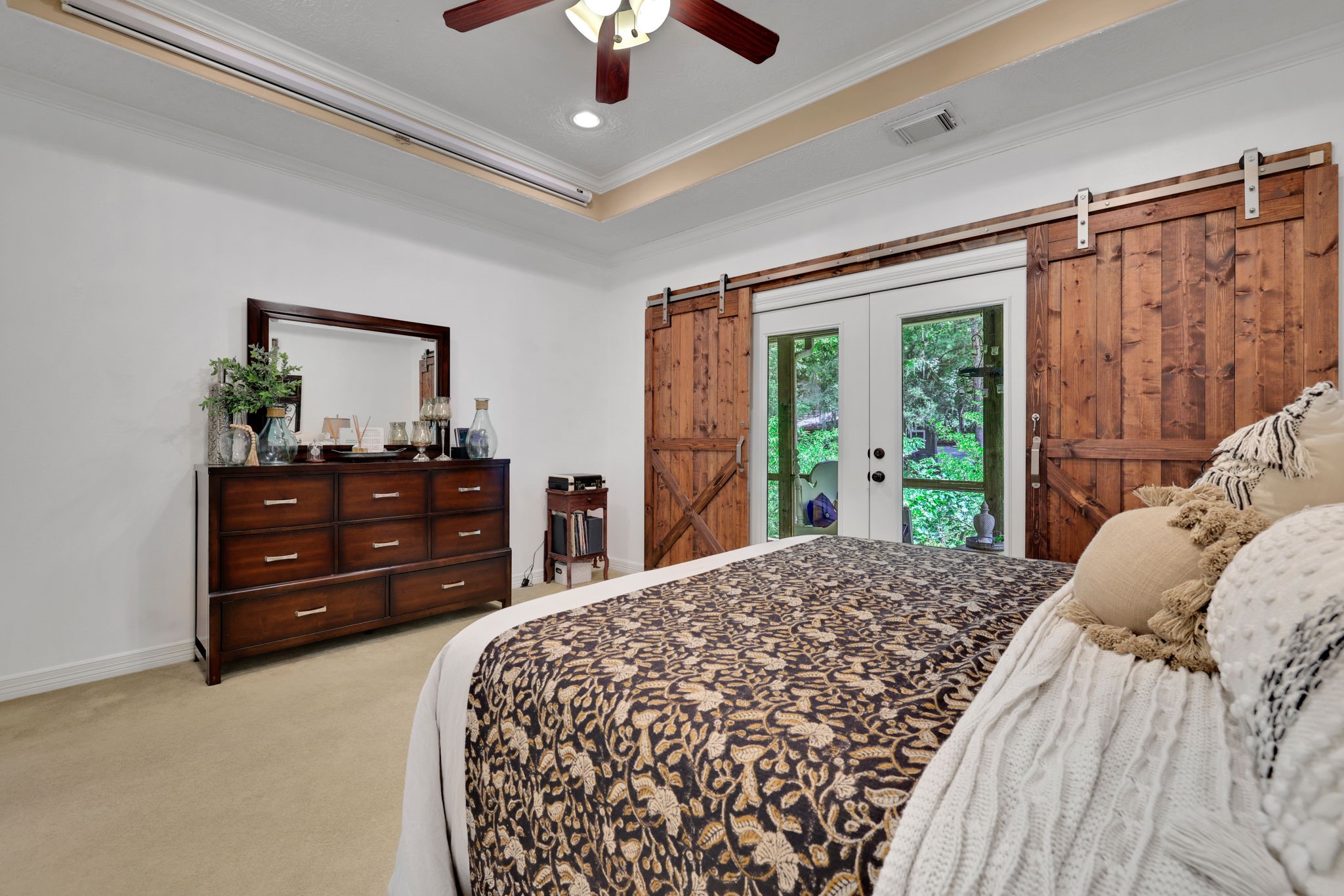 991 Kings Way Coldspring, TX 77331 - Photo 20 of 49 From the primary bedroom you can walk out to the screen in porch