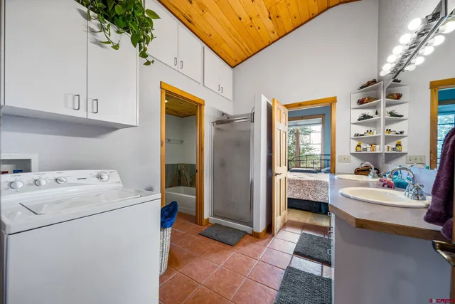 a utility room with dryer and washer