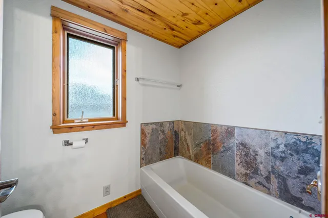 a bathroom with a bathtub