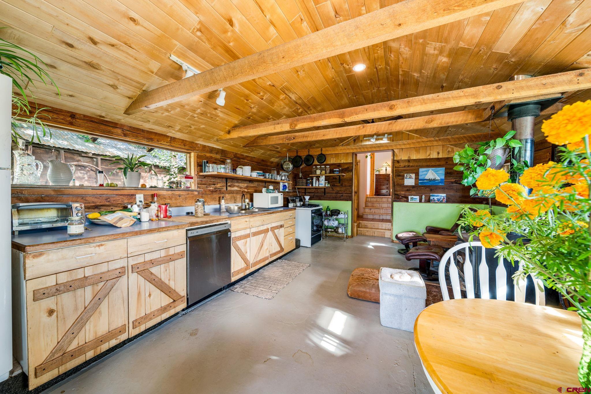 1204 County Road 332 Ignacio, CO 81137 - Photo 22 of 38 a kitchen with granite countertop lots of counter top space