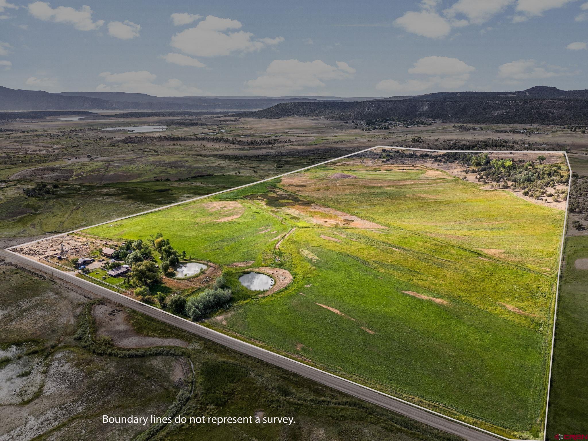 1204 County Road 332 Ignacio, CO 81137 - Photo 27 of 38 a view of a swimming pool with a lounge chair