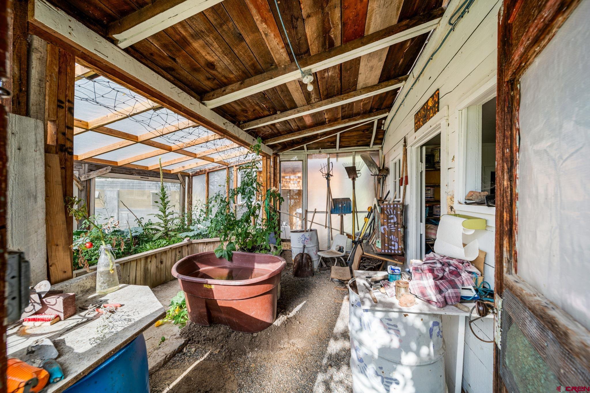 1204 County Road 332 Ignacio, CO 81137 - Photo 35 of 38 a view of a patio with couple of chairs and a potted plant