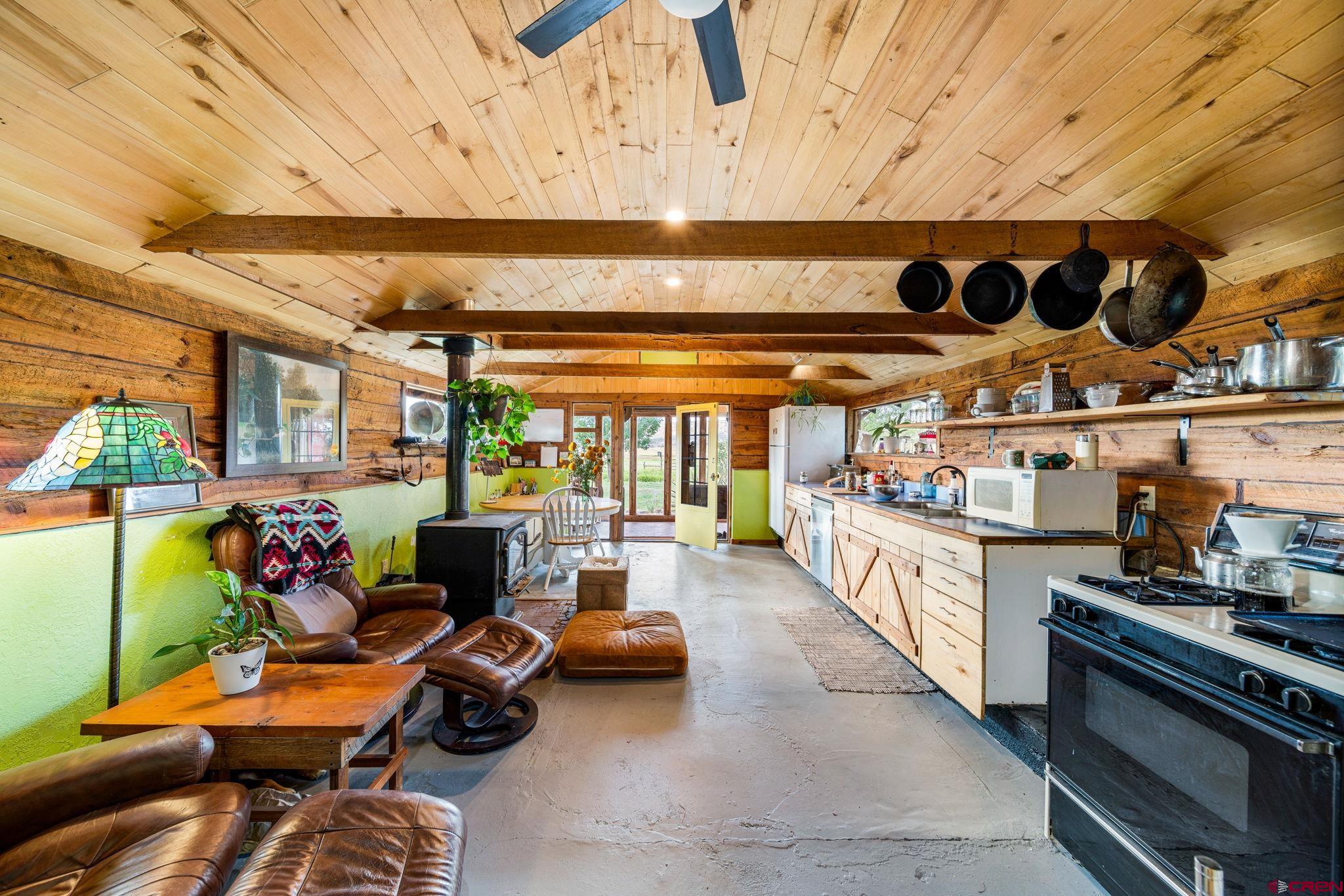 1204 County Road 332 Ignacio, CO 81137 - Photo 4 of 38 a group of people sitting in a room