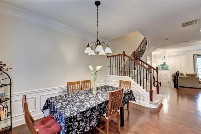 a view of a dining room with furniture