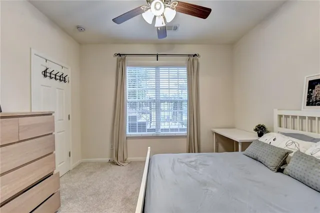 a bathroom with a toilet a sink and a shower