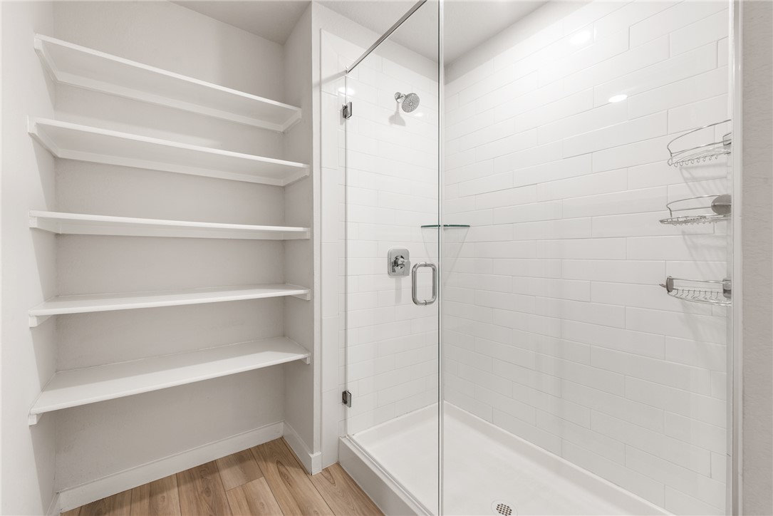 918 Kickapoo Lane College Station, TX 77845 - Photo 22 of 31 a bathroom with a shower