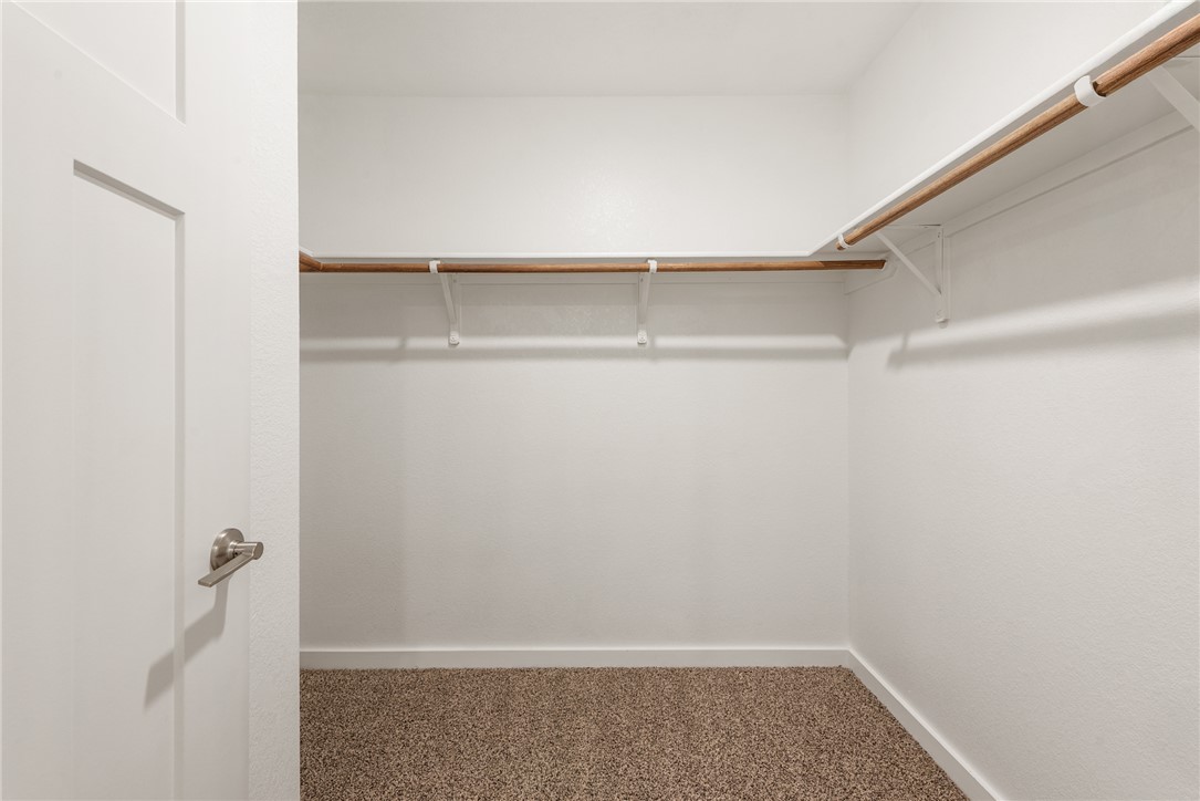 918 Kickapoo Lane College Station, TX 77845 - Photo 23 of 31 a view of an empty walk in closet