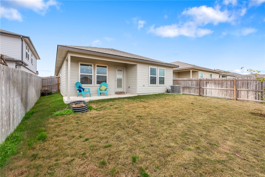 918 Kickapoo Lane College Station, TX 77845 - Photo 5 of 31 a view of a house with a small yard and wooden fence