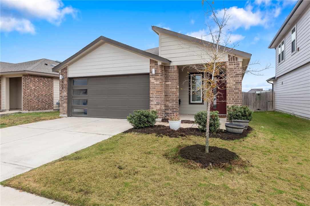 918 Kickapoo Lane College Station, TX 77845 - Photo 6 of 31 a front view of a house with garden
