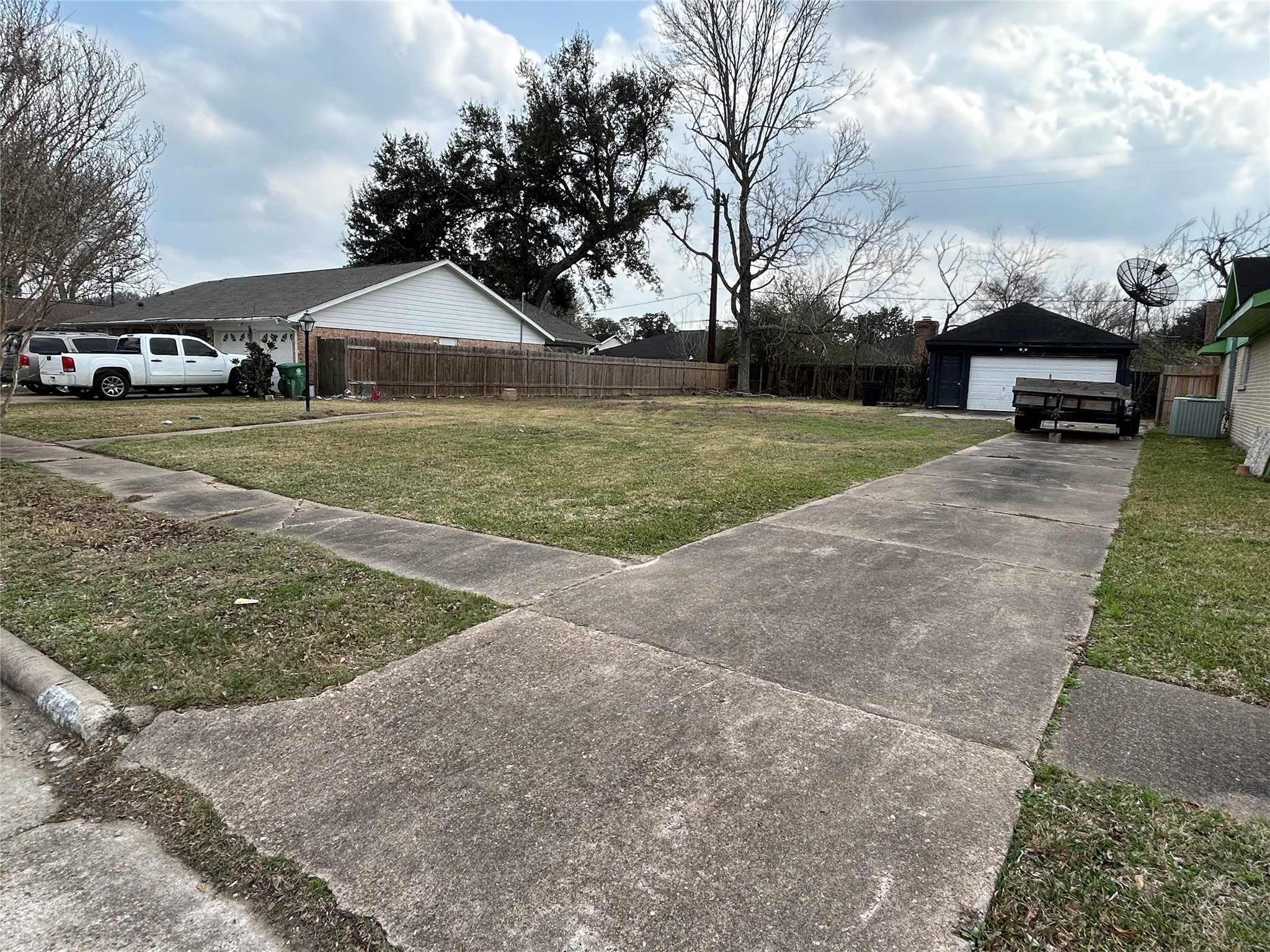 8218 Gulf Spring Lane Houston, TX 77075 - Photo 1 of 7 a view of street with parked cars