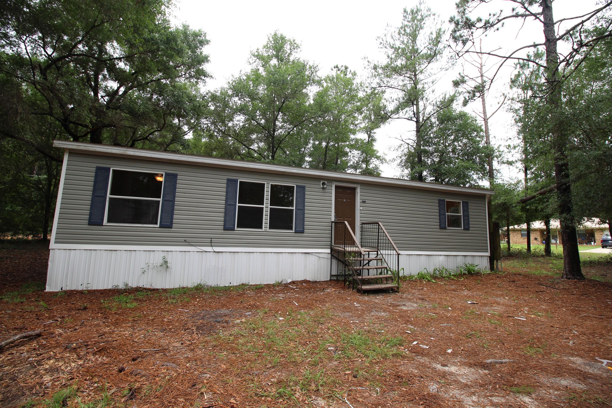 1624 Garrett Mill Road Baker, FL 32531 - Photo 1 of 22 Exterior Front