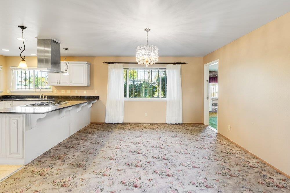 10486 Spaulding Way Rancho Cordova, CA 95670 - Photo 18 of 74 a view of a kitchen with a sink and windows