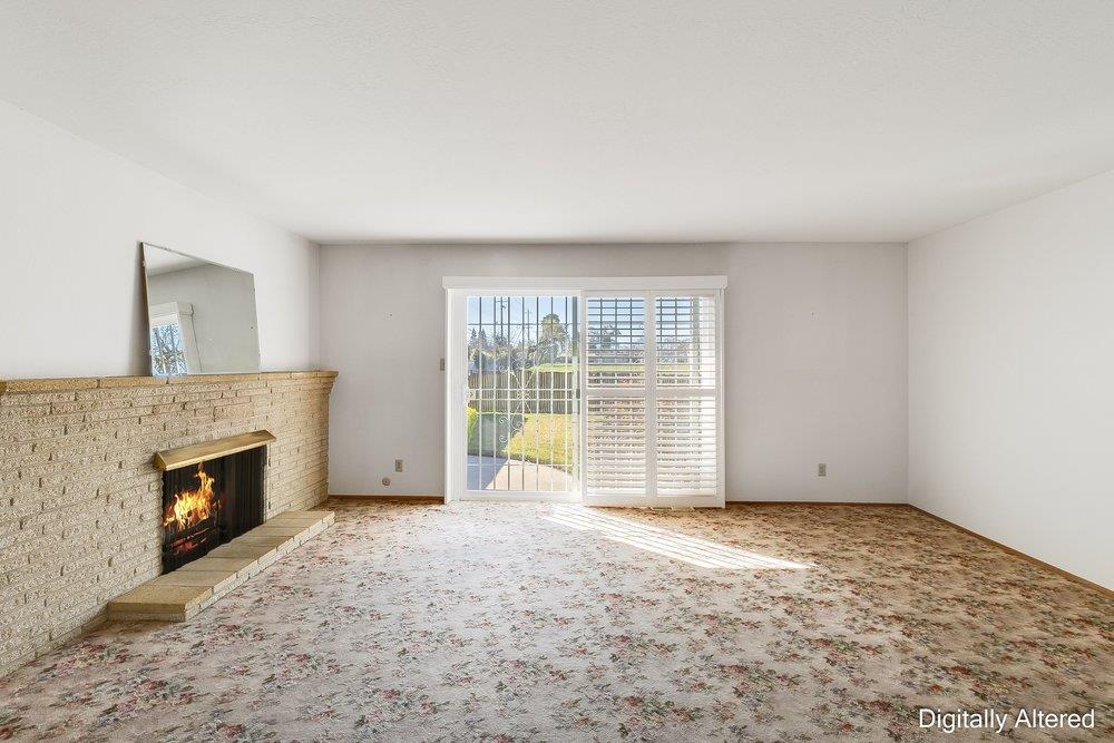 10486 Spaulding Way Rancho Cordova, CA 95670 - Photo 23 of 74 a view of an empty room with a fireplace