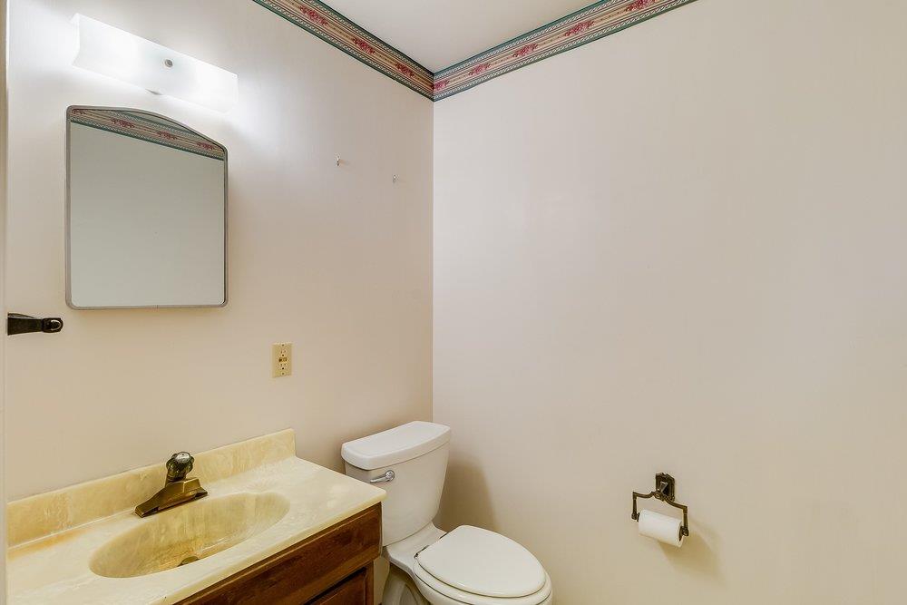 10486 Spaulding Way Rancho Cordova, CA 95670 - Photo 32 of 74 a bathroom with a sink toilet and mirror
