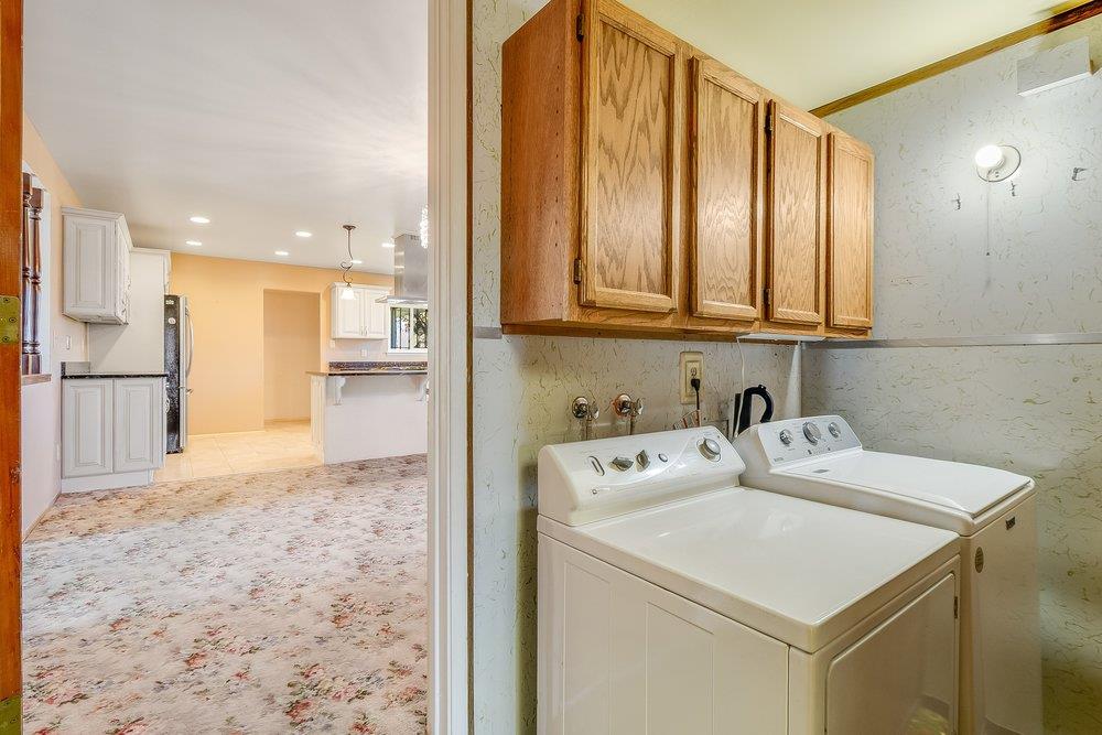 10486 Spaulding Way Rancho Cordova, CA 95670 - Photo 34 of 74 a kitchen with stainless steel appliances granite countertop a refrigerator sink and cabinets