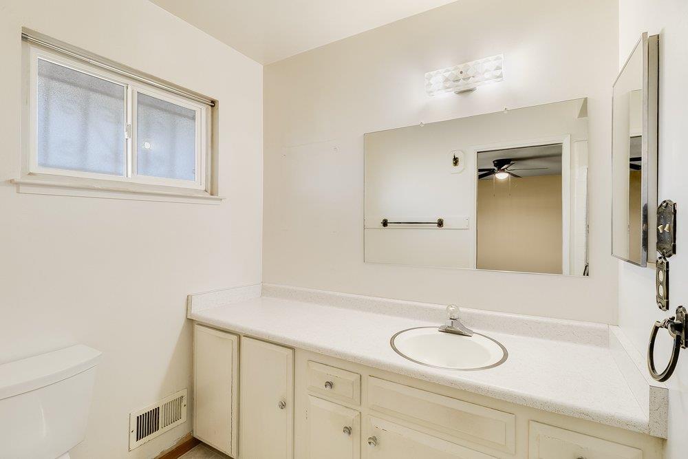 10486 Spaulding Way Rancho Cordova, CA 95670 - Photo 47 of 74 a bathroom with a sink and a mirror