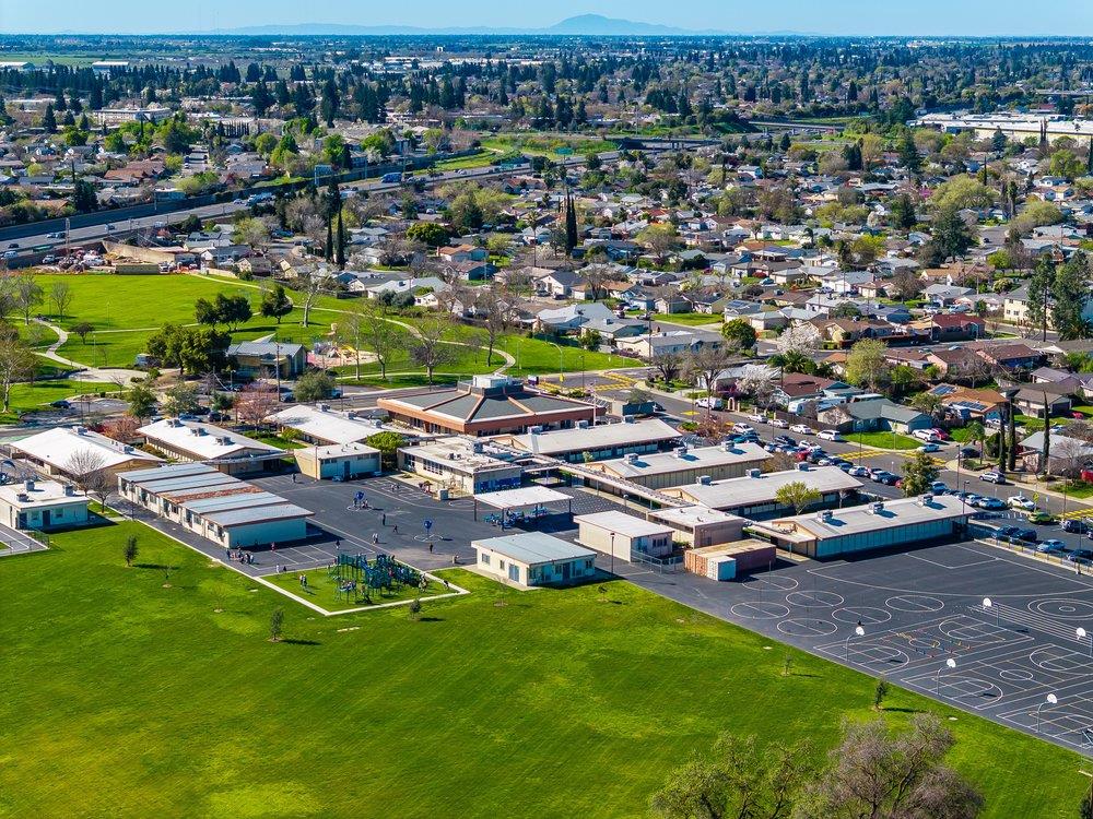 10486 Spaulding Way Rancho Cordova, CA 95670 - Photo 74 of 74 an aerial view of a house with a garden and lake view