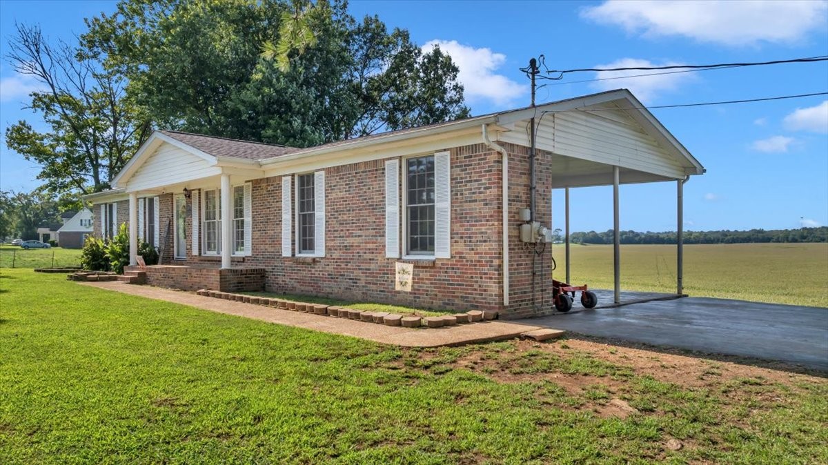 1660 Vales Mill Road Pulaski, TN 38478 - Photo 3 of 35 a view of a house with backyard and sitting area